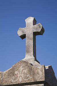 Granite cross in a cemetery; Laval, Quebec, Canada