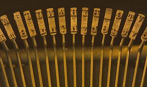 Row of keys on old manual typewriter