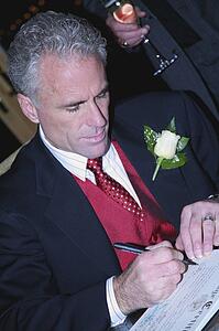 Groom writing signature
