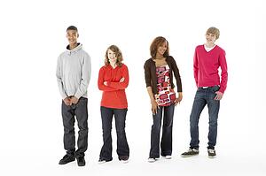 Group Of Four Teenagers In Studio