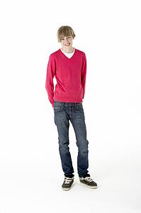 Full Length Studio Portrait Of Teenage Boy