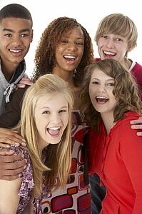 Studio Portrait Of Five Teenage Friends