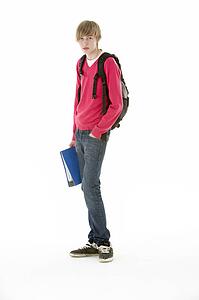 Full Length Studio Portrait Of Male Teenage Student
