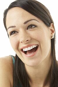 Studio Portrait Of Laughing Woman