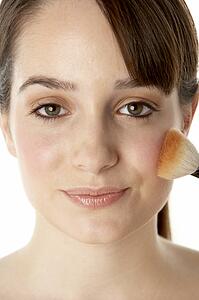 Teenage Girl Applying Make Up