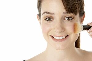 Teenage Girl Applying Make Up