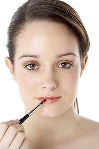 Teenage Girl Applying Make Up