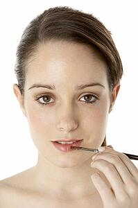 Teenage Girl Applying Make Up