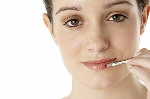 Teenage Girl Applying Make Up