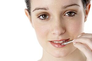 Teenage Girl Applying Make Up