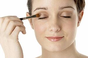 Teenage Girl Applying Make Up