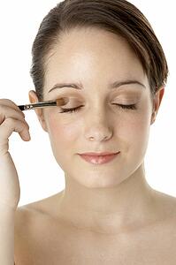 Teenage Girl Applying Make Up