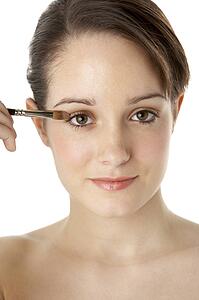 Teenage Girl Applying Make Up