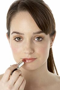 Teenage Girl Applying Make Up
