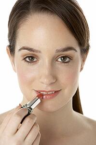 Teenage Girl Applying Make Up
