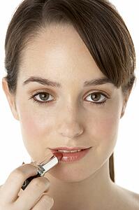 Teenage Girl Applying Make Up