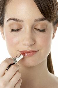 Teenage Girl Applying Make Up