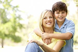 Portrait Of Mother And Son In Park