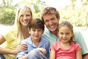 Family Enjoying Day In Park