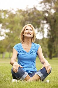 Senior Woman Relaxing In Park