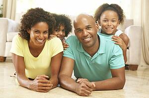 Family Relaxing At Home Together