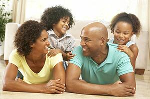 Family Relaxing At Home Together