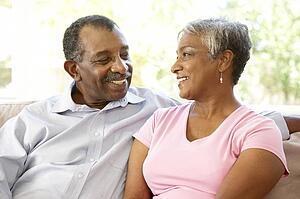 Senior Couple Relaxing At Home Together