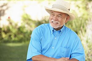 Senior Man Relaxing In Garden