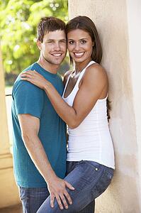 Romantic Young Couple Outside Building