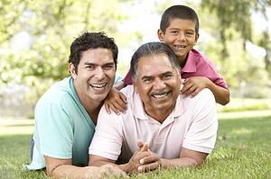 Grandfather With Son And Grandson In Park