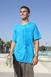 Teenage Boy In Skateboard Park