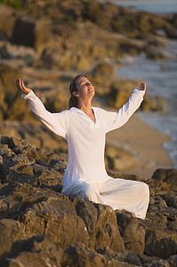 Woman with arms raised