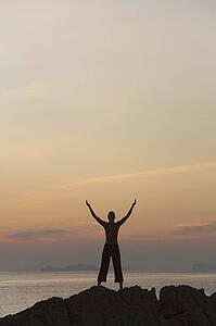 Person with arms raised