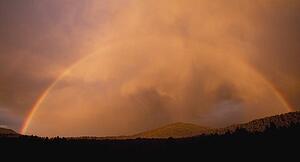 Rainbow at sunset, Jemez Mountains, New Mexico, USA