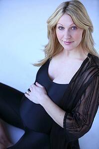 Pregnant woman in black leotard
