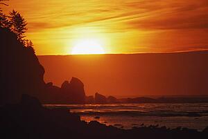 Sunset on the rugged edge of Ouzette Island, coast of Olympic Peninsula, Washington, USA