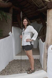 Woman in front of Shompole Lodge, Great Rift Valley, Kenya, Africa