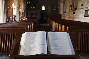 Open Bible at the front of a church