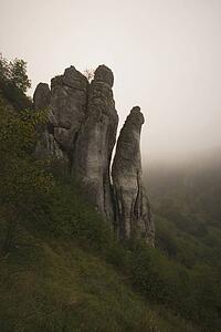 Rocky cliff in the fog