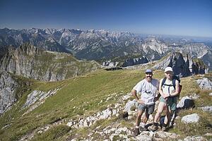 Couple hiking trail on Centennial Ridge, Kananaskis Country, Alberta, Canada