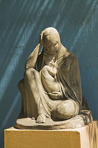 stone statue of the virgin mary holding jesus, buenos aires, argentina