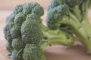 two broccoli heads and stems