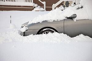 a car surrounded by snow