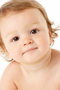 Close Up Studio Portrait Of Baby Boy