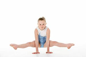 Studio Portrait Of Young Female Gymnast