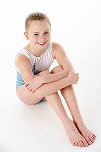 Studio Portrait Of Young Female Gymnast