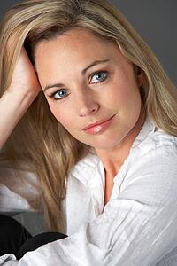Studio Portrait Of Woman Wearing White Shirt