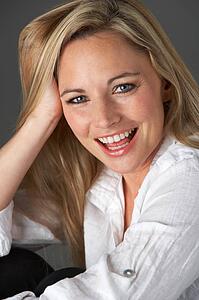 Studio Portrait Of Woman Wearing White Shirt