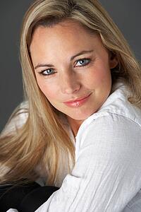 Studio Portrait Of Woman Wearing White Shirt