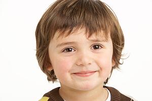 Studio Portrait Of Young Boy